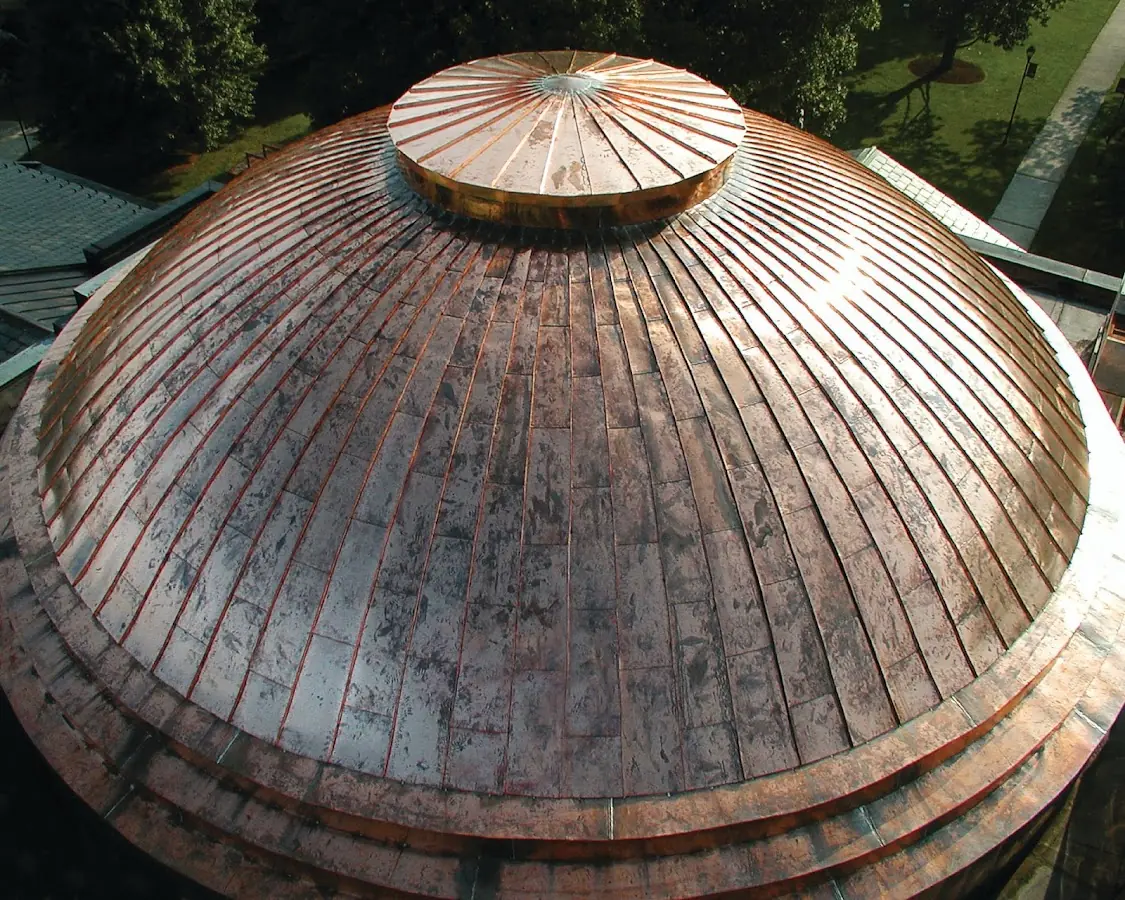 Craftsman Roofing crew installing a new roof in West Groton